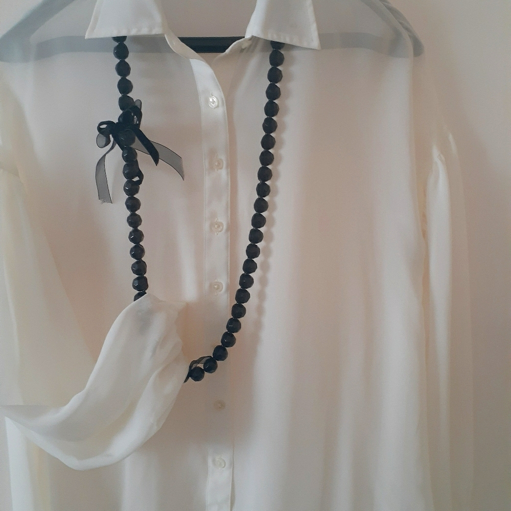 Blouse and necklace